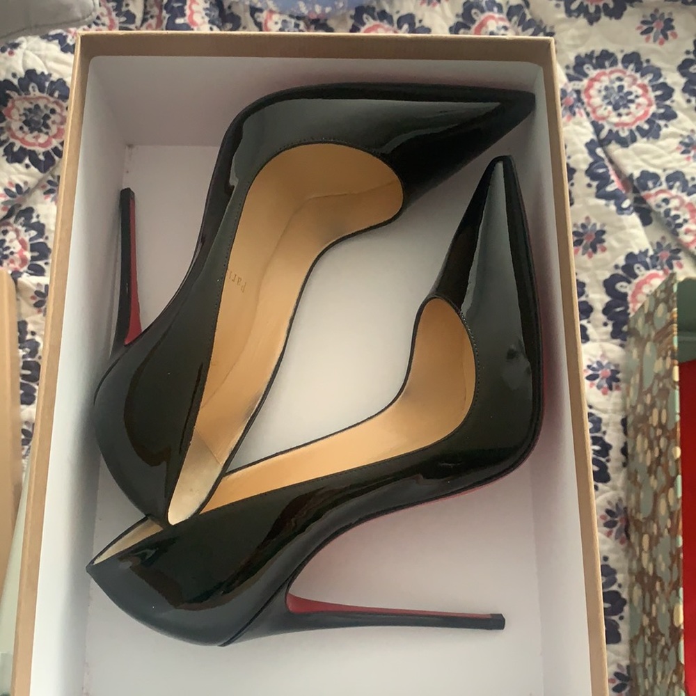Worn once Louboutin authentic.
